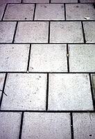 Repeated pattern of paving slabs