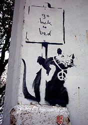 Stencil graffiti by Banksy