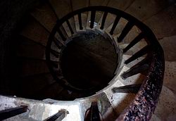 Looking down the centre of a spiral staircase