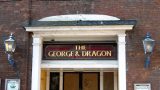 The fire's gone out of the George and Dragon